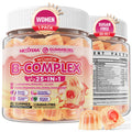 Two clear plastic jars of NextD24 B-Complex gummy candies with white lids, shown on a white background with a few loose gummies in the foreground. The packaging features pink and red graphics with text indicating 'Women', '1 Pack', 'Sugar Free', and '25-In-1'.